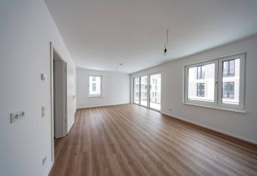 Neubauwohnung an der Waterkant mit Fußbodenheizung und Balkon / WBS 220