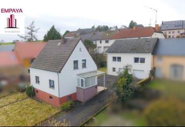 Einfamilienhaus mit exclusivem Nebengebäude in Schillingen