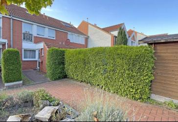 Familientraum in ruhiger Lage in Wettbergen - junges, gepflegtes RMH mit Garten, Garage & überdachter Abstellfläche