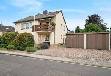Ein Haus, zwei Wohnungen, unzählige Möglichkeiten - modernisiertes Zweifamilienhaus in Meerbusch
