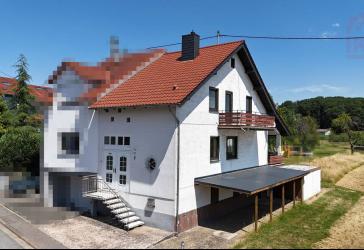 Gepflegte Doppelhaushälfte mit Garage, Terrasse und einem großem Garten in Heusweiler-Holz