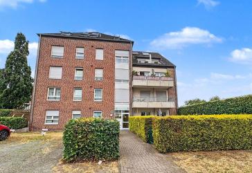 Hell und gemütlich: 4,5 Zimmer-Maisonette mit Balkon und Tiefgaragenstellplatz in Wanne-Eikel