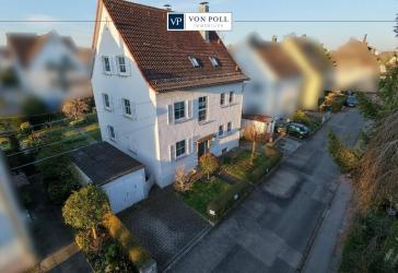 Großzügiges Zweifamilienhaus mit sonnigem Garten und Balkon