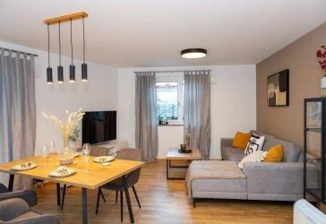 2-Zimmer Neubau mit Balkon + EBK + TG
