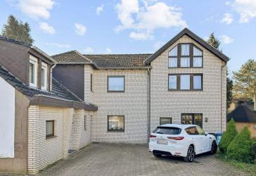 Vermietetes Wohnjuwel mit ca. 97 m² Wohnfläche, Galerie, Balkon und Garten