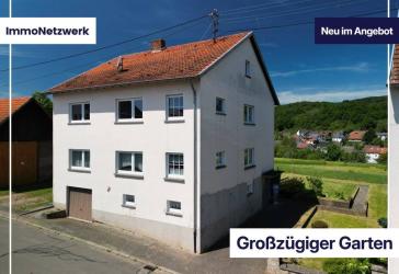 Gartenparadies mit Weitblick - großzügiges Zweifamilienhaus in Krottelbach