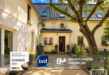 Charmantes Einfamilienhaus mit Garten, Kamin und viel Entwicklungspotenzial