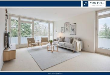 Großzügige Wohnung mit Sonnenbalkon und Tiefgaragenplatz