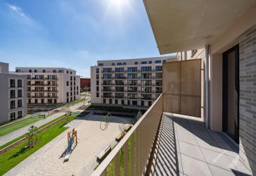 Neubauwohnung an der Waterkant mit Balkon und 2 Bädern / WBS 220