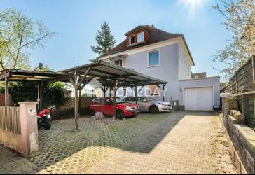 Attraktives Zweifamilienhaus mit Garten, Vermietungspotenzial und vielseitigen Nutzungsmöglichkeiten