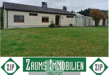 Einfamilienhaus mit 2 Wintergärten in Zentraler Ortslage mit 2 Garagen mit Unterbau und Weitsicht