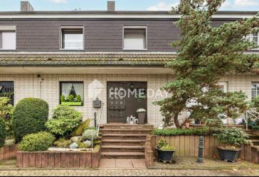 Ein Zuhause mit Substanz: durchdachter Grundriss, Terrasse mit Pergola und viel Raum für Familie