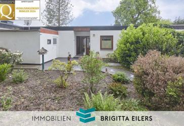 Wohnen auf einer Ebene - gepflegter Flachdachbungalow mit Wintergarten, Garage und neuwertigem Bad