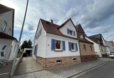 Vielseitiges Ein- bis Zweifamilienhaus mit Garten und Garage