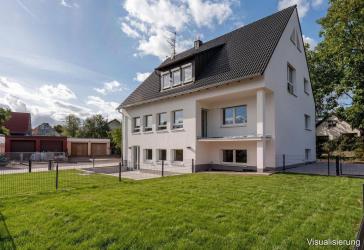 Hochwertig sanierte 4-Zimmer-OG-Wohnung mit Balkon, Garten und 2 Stellplätzen