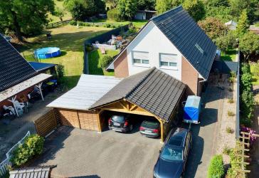 Modernes KfW-55-Einfamilienhaus mit Wintergarten auf großzügigem Grundstück in Brüttendorf