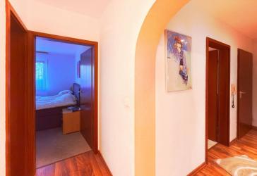 Kapitalanlage mit Perspektive: EG-Wohnung mit Südterrasse und TG-Stellplatz