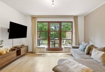Gemütliche 2-Zimmer-Gartenwohnung mit Tiefgaragenstellplatz und guter Verkehrsanbindung