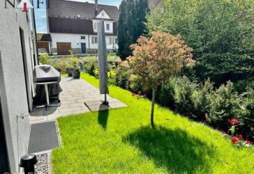 Stilvoll wohnen auf höchstem Niveau - Exklusive Gartenwohnung im modernen KfW-55-Neubau