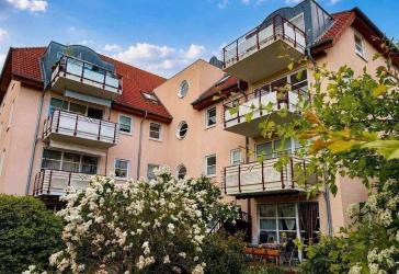 Kapitalanlage in parkähnlicher Wohnanlage in Potsdam-Bornstedt | Vermietete 3-Zimmer-Wohnung mit Balkon, Aufzug & Tiefgarage