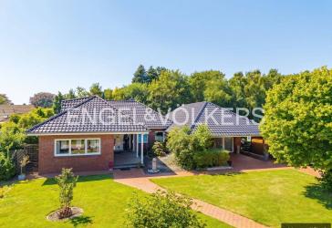 Bungalow mit großzügigem Grundstück, Einliegerwohnung Werkstatt und Carport in Großwolderfeld