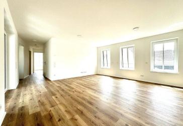 Neubau-Erstbezug A+ - 3 Zimmer mit Balkon und Garage nahe dem Zentrum