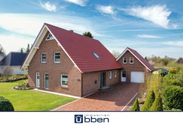 Modernes und energieeffizientes Einfamilienhaus mit großem Garten und durchdachtem Grundriss