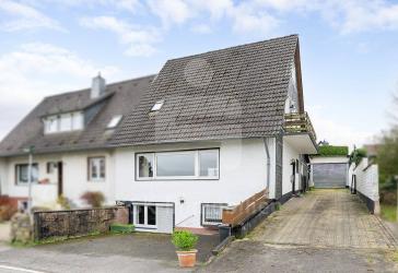 Wohnungseigentum: Doppelhaushälfte in Burscheid