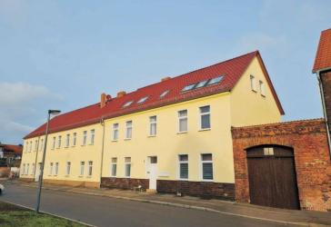 Solides Renditeobjekt mit 5-Jahres-Mietvertrag in zentraler Lage in Bitterfeld - 10% Rendite!