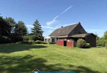 gepflegtes Einfamilienhaus mit traumhaften Gartengrundstück in küstennaher Dorflage