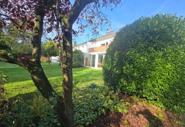 Charmante Doppelhaushälfte mit Südgarten, Wintergarten, PV-Anlage und moderner Heiztechnik