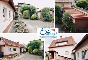 Vorderhaus = Rendite; Hinterhaus = eigenes Zuhause; 2 Garagen dazu. Was will man mehr?!