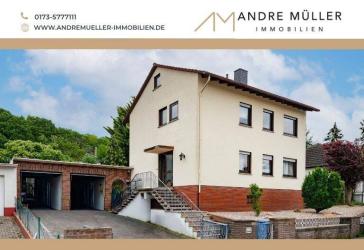 Ein bis Zweifamilienhaus mit Traumgrundstück und Doppelgarage mit Werkstattgrube in Wörrstadt