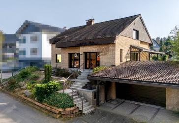Burscheid: Freistehendes Einfamilienhaus mit Charme und Sonnengrundstück in begehrter Wohnlage
