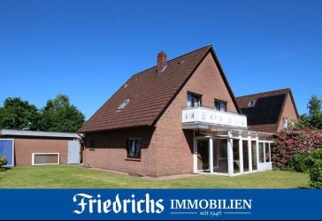 Gepflegtes Einfamilienhaus mit eingegrüntem Garten sowie zwei Garagen in Edewecht-Osterscheps