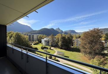 Bergblick über den Baumkronen - mit knapp 5 % Rendite oder zum Selbstbezug