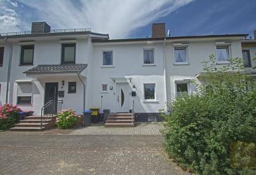 Kapitalanlage - Moderne und teilsaniertes Mittelreihenhaus mit Garage in ruhiger Lage