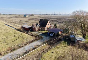 Einfamilienhaus direkt hinter dem Deich - Wintergarten, Kamin & großer Garten