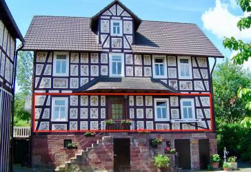Charmante 3-Zimmer-Wohnung im sanierten Fachwerkhaus mit Terrassensitzplatz und Stellplatz in Marburg-Moischt
