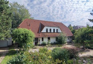 Mehrfamilienhaus mit parkähnlichem Grundstück in Ostseenähe