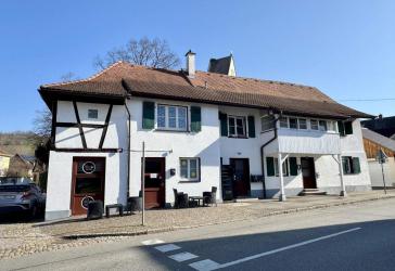 Mehrfamilienhaus mit Gastro-Gewerbe in Weil am Rhein / Altweil