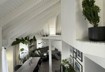 Wohnen mit Charakter - moderne Maisonette mit beeindruckender Dacharchitektur Garten & Pool
