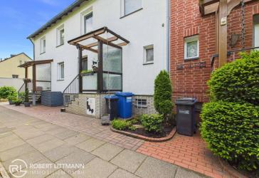 Familienglück auf drei Ebenen - gepflegtes Reihenmittelhaus mit Garten, Terrasse und Garage