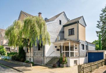 Aufgepasst Handwerker! Einzigartiges Zweifamilienhaus mit 2 separaten Eingängen.