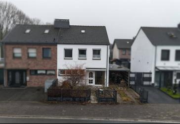 Hier beginnt Zuhause - charmante Doppelhaushälfte mit grünem Rückzugsort und Garage