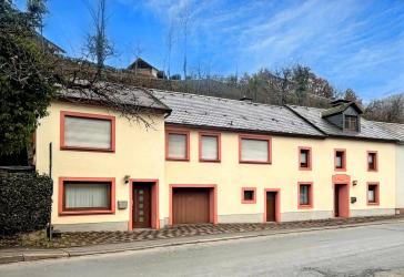 Mehrfamilienhaus kaufen in 54673 Neuerburg 
