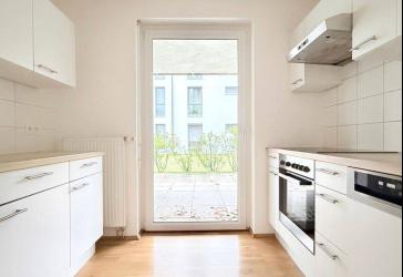 Sonnenverwöhnte Erdgeschosswohnung mit Terrasse, moderner Einbauküche & Tageslichtbad