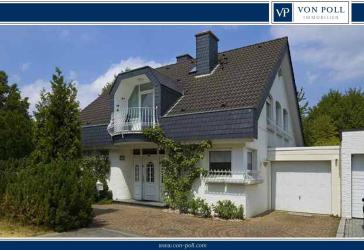 Exklusives Einfamilienhaus mit Innen- und Außenpool sowie elegantem Kaminambiente