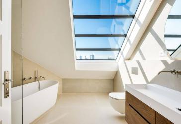 Urbaner Luxus im Altbau über den Dächern von München