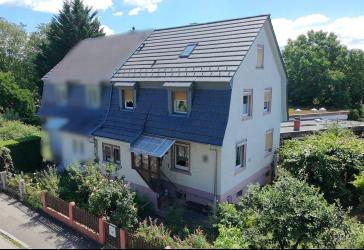 Charmante Doppelhaushälfte mit großem Garten in innenstadtnaher Lage
